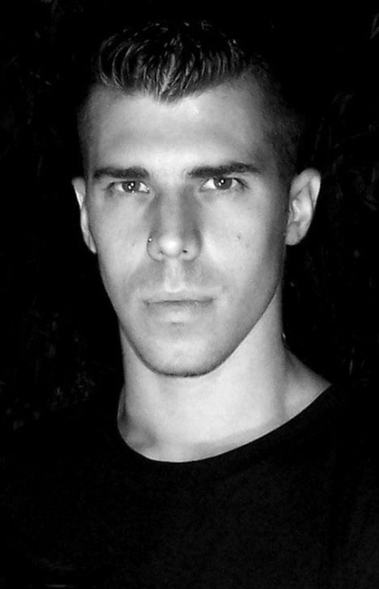 A black and white photo of Chris Garetano.