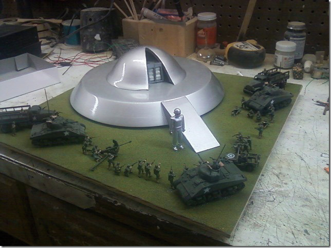 A scale model of the scene from The Day the Earth Stood Still with Gort coming out of the spaceship to an array of plastic soldiers. Hi Kevan!