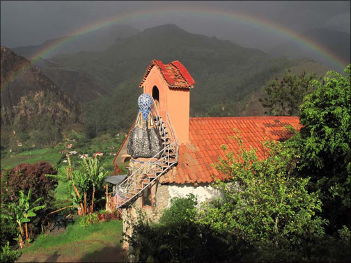 A scene from Montesuenos, with a rainbow.